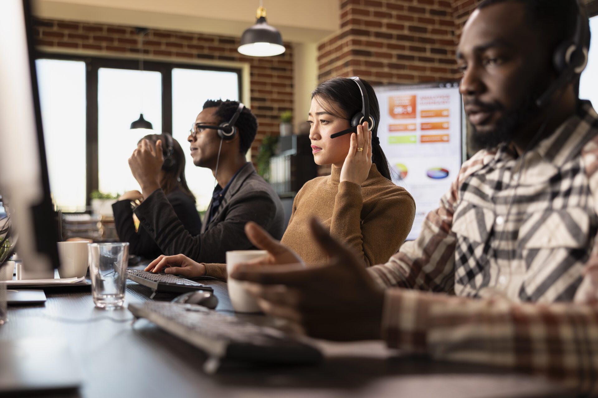 multiethnic customer support team at work